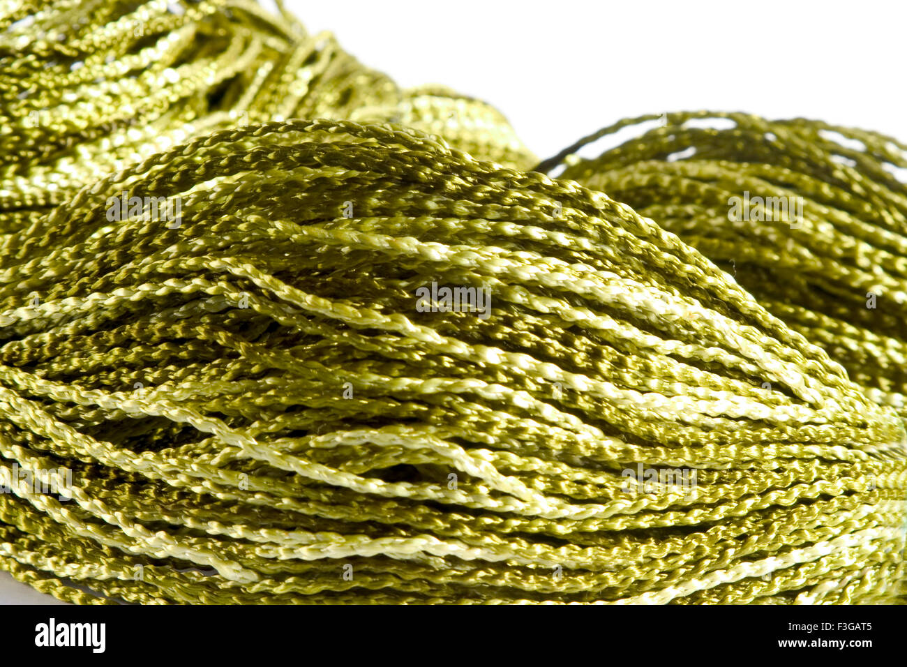 Concept ; crochet silky green thread on white background Stock Photo
