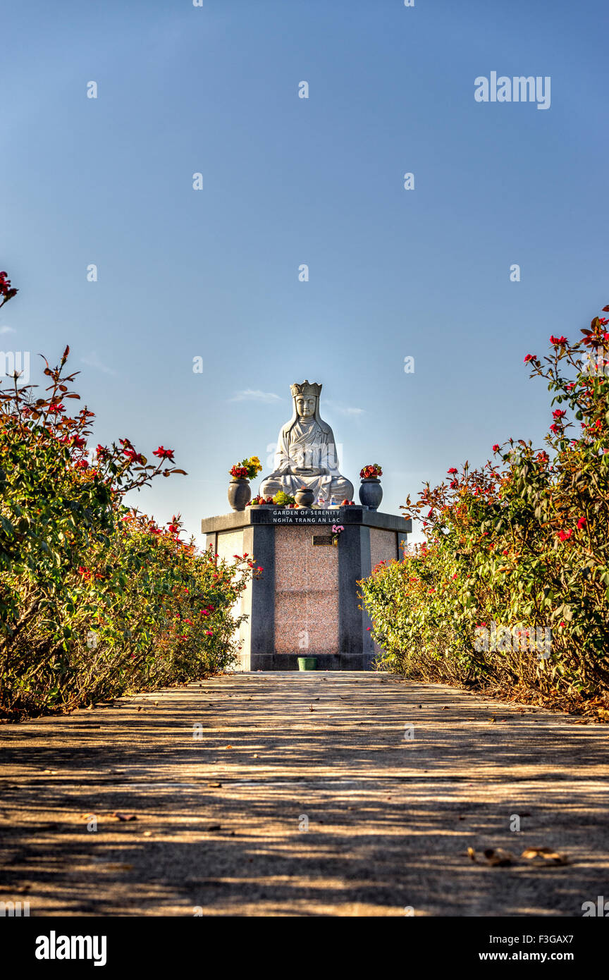 Houston TX USA 8/15/2015:  Sitting Buddha at Forest Park Cemetery Stock Photo