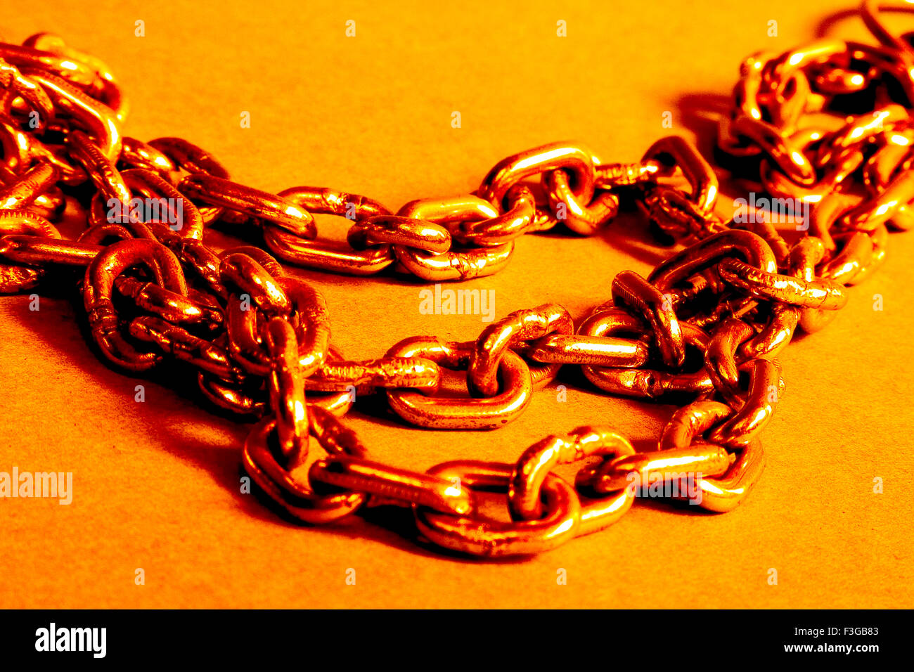 iron chain on brown background Stock Photo
