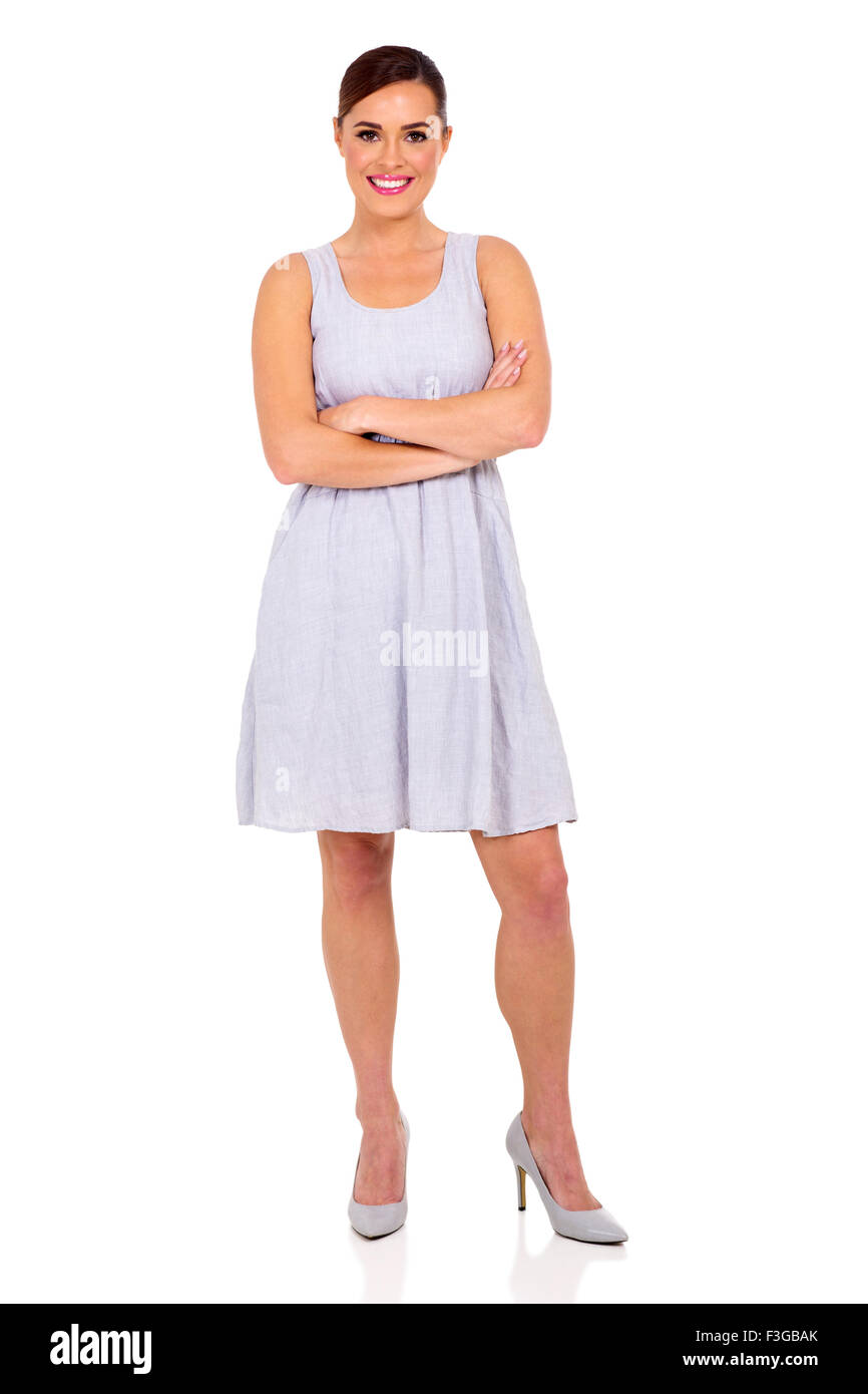 cheerful young woman wearing a dress isolated on white Stock Photo