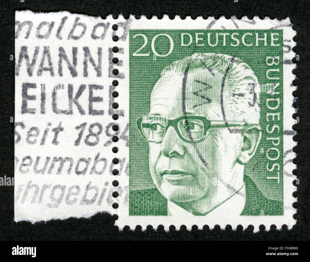 GERMANY - CIRCA 1971 A stamp printed in Germany showing a portrait of Federal President Gustav Walter Heinemann, circa 1971. Stock Photo