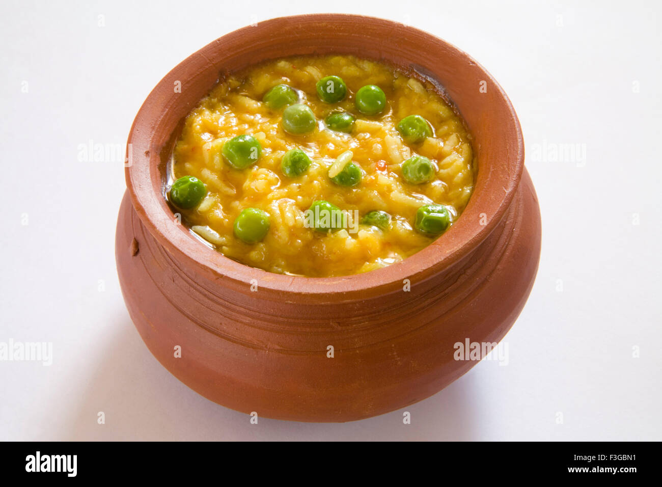 Khichdi served in pot made from basmati rice arhar toor dal yellow