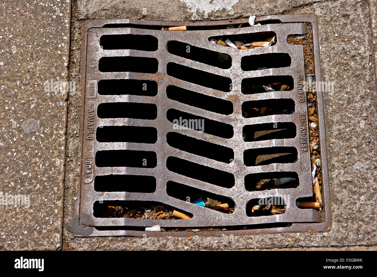 Drainage duct on road ; London ; U.K. United Kingdom England Stock Photo