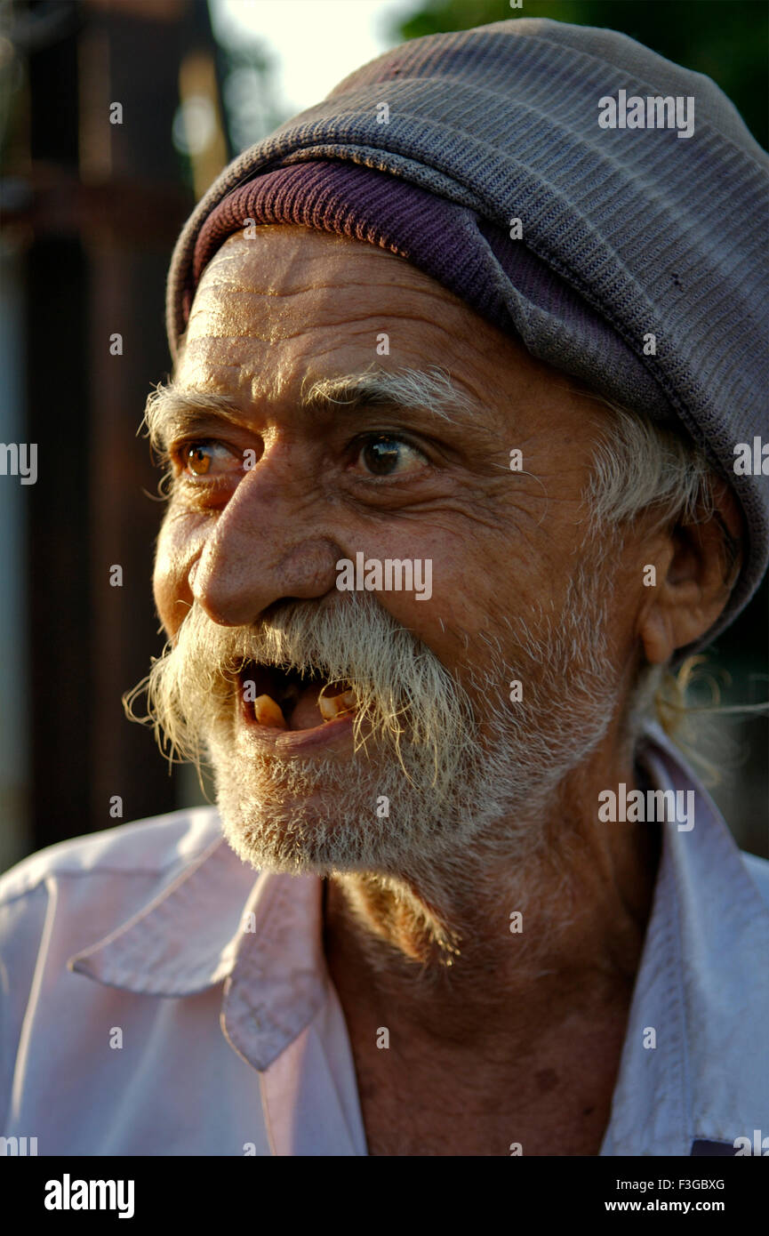 Wonder struck on Kathiawadi Gujarati old man unshaved faces ; Rajkot ; Gujarat ; India MR#711 Stock Photo