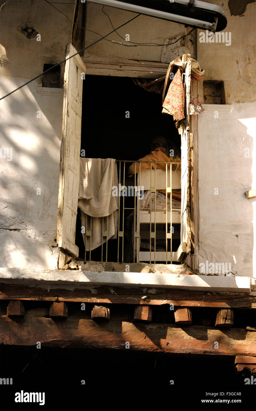 old house window ; Lambeshwar ni Pol ; Kalupur ; Ahmedabad ; Gujarat ; India ; Asia Stock Photo