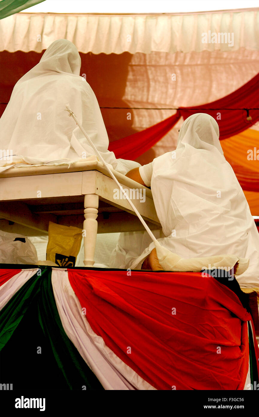 Two Jain Sadhvis lady monks in white saris at Conference ; Bombay