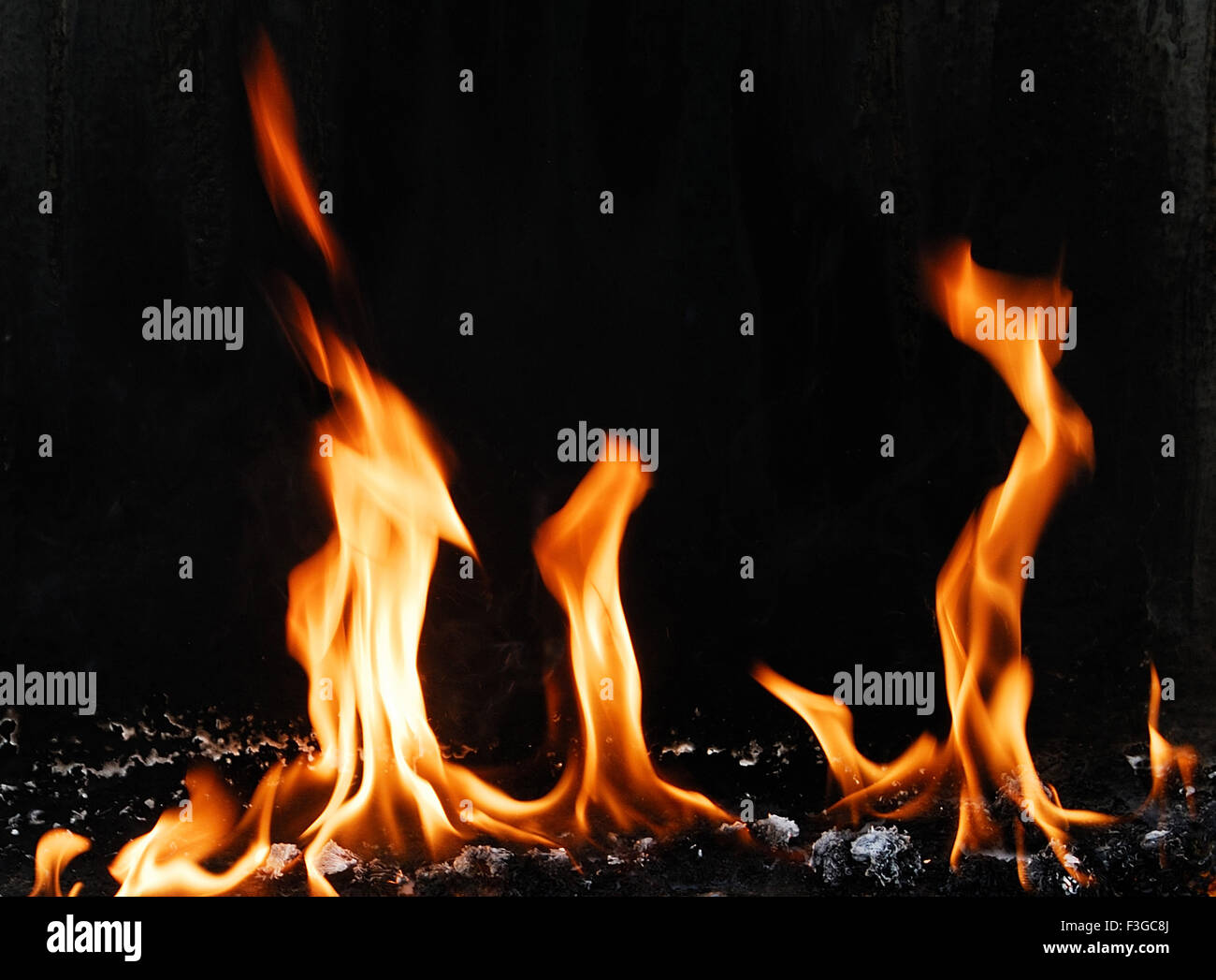 Fire pattern created by burnings candles looking as some ghosts are dancing Stock Photo