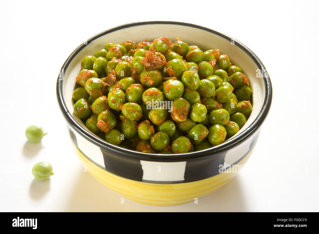 Vegetable green peas mutter Indian cuisine spicy breakfast or snack served in bowls ; India Stock Photo
