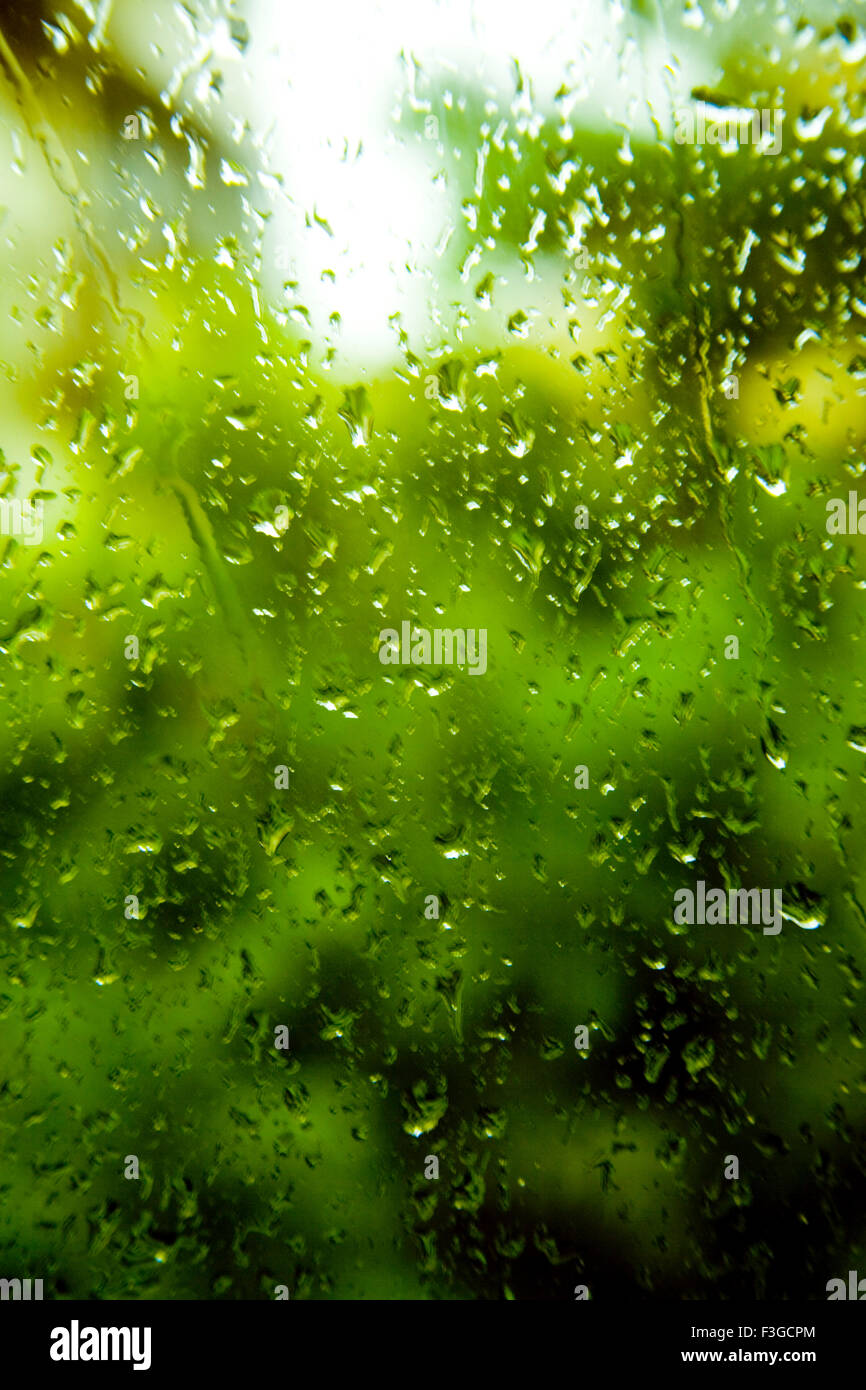 Dew drops on glass monsoon rainy season Stock Photo
