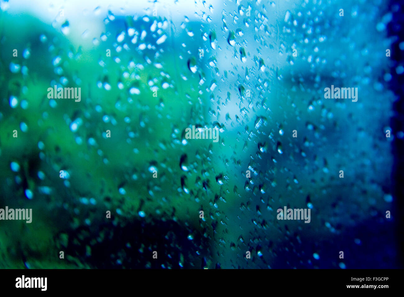 Dew drops on glass monsoon rainy season Stock Photo