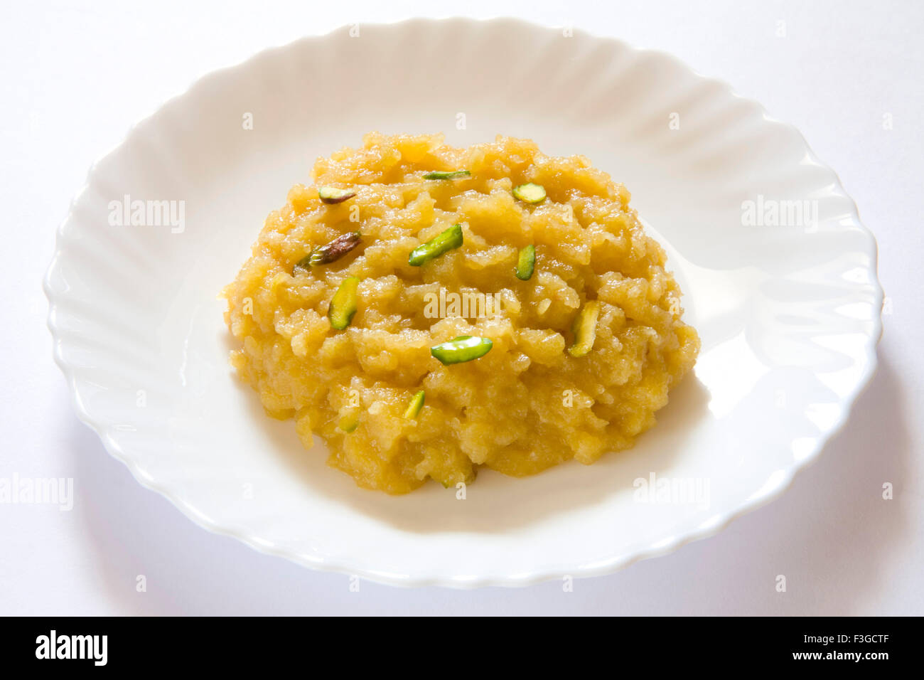 Indian food ; sweet dessert sapherchand ka halwa fruits apple fudge porridge Stock Photo