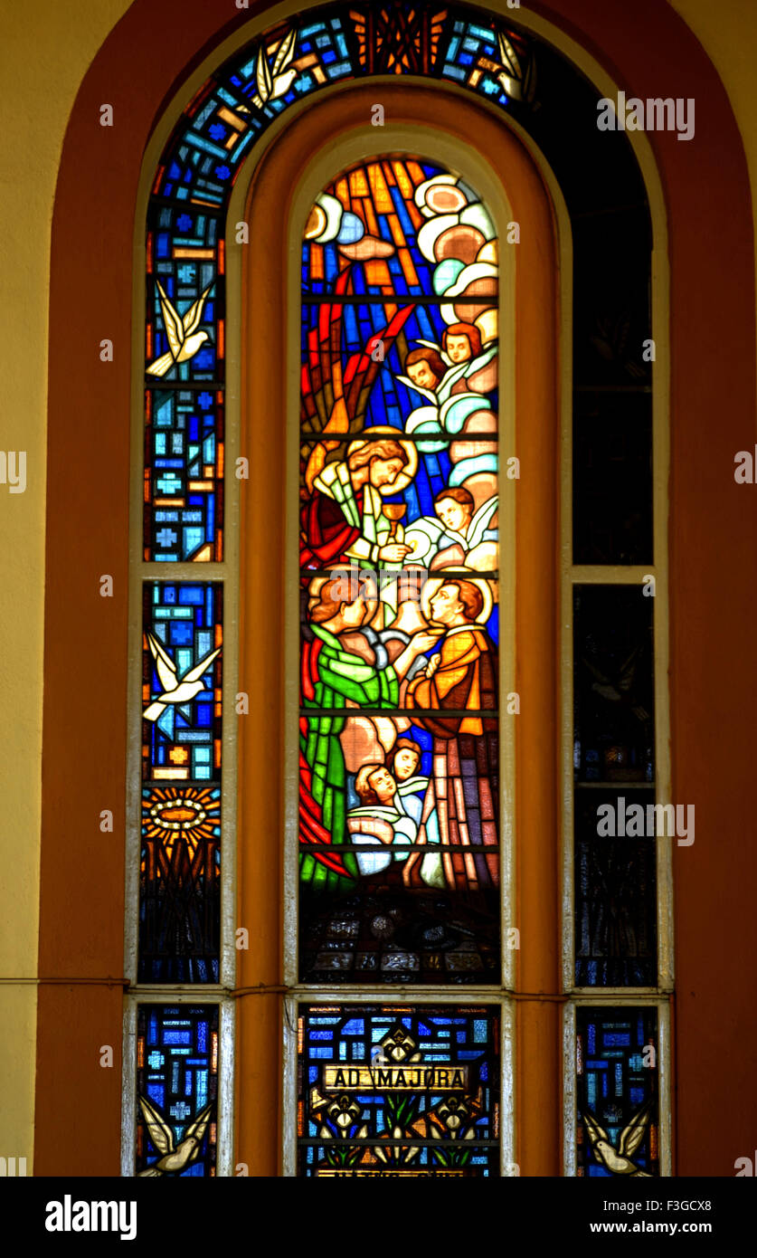 Admajora assumption of Virgin marry into paradise on stained glass Stock Photo