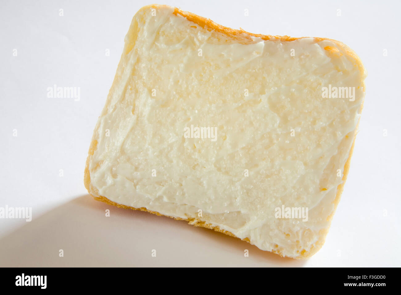 Breakfast food ; butter applied on single slice of bread Stock Photo