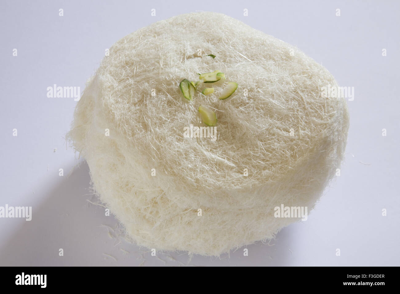 Sweet sugar floss buddhi ka ball on white background Stock Photo