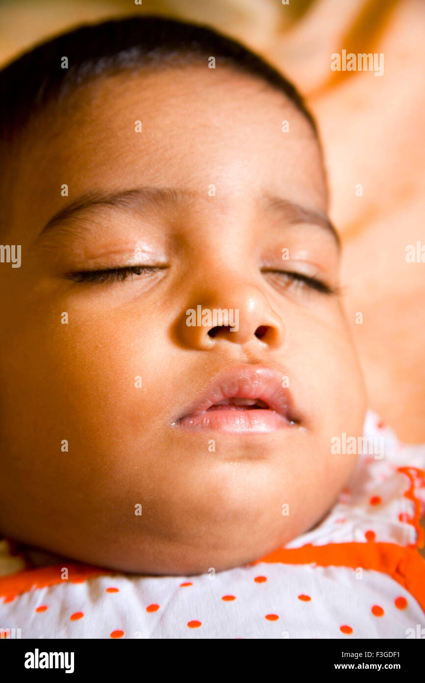 One year old baby Pranjali sleeping ; India MR#201 Stock Photo