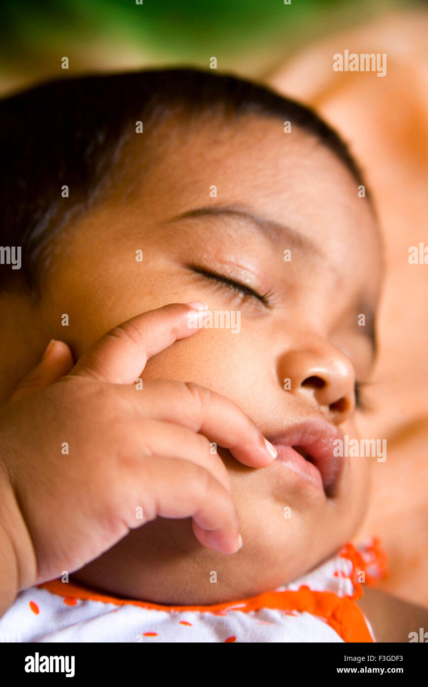 One year old baby Pranjali sleeping ; India MR#201 Stock Photo