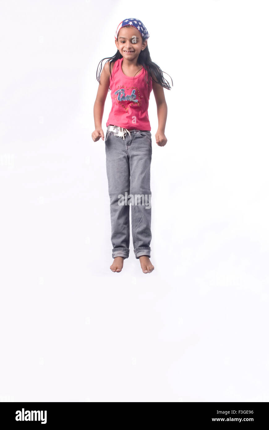 Young girl jumping in mid air MR#733 Stock Photo