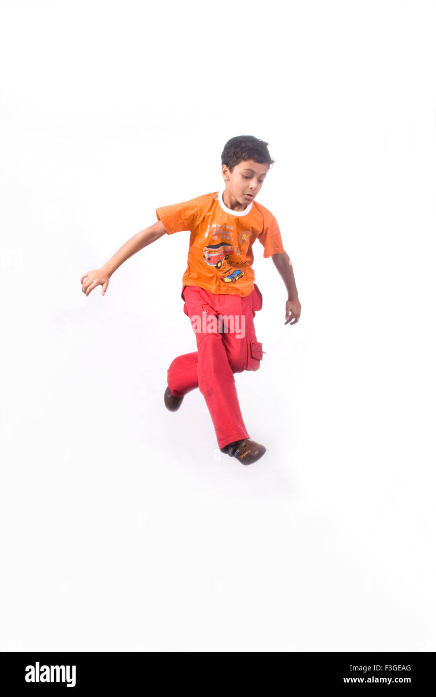 Teenager wearing orange t shirt hi-res stock photography and images - Alamy