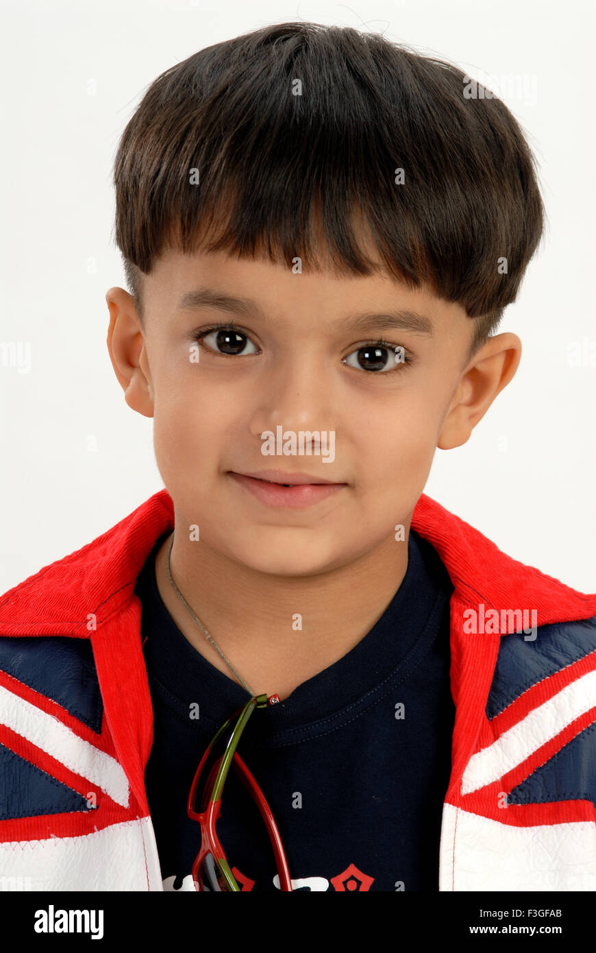 South Asian Indian boy looking at camera and smiling ; Bombay Mumbai ;  Maharashtra ; India MR#682N Stock Photo - Alamy