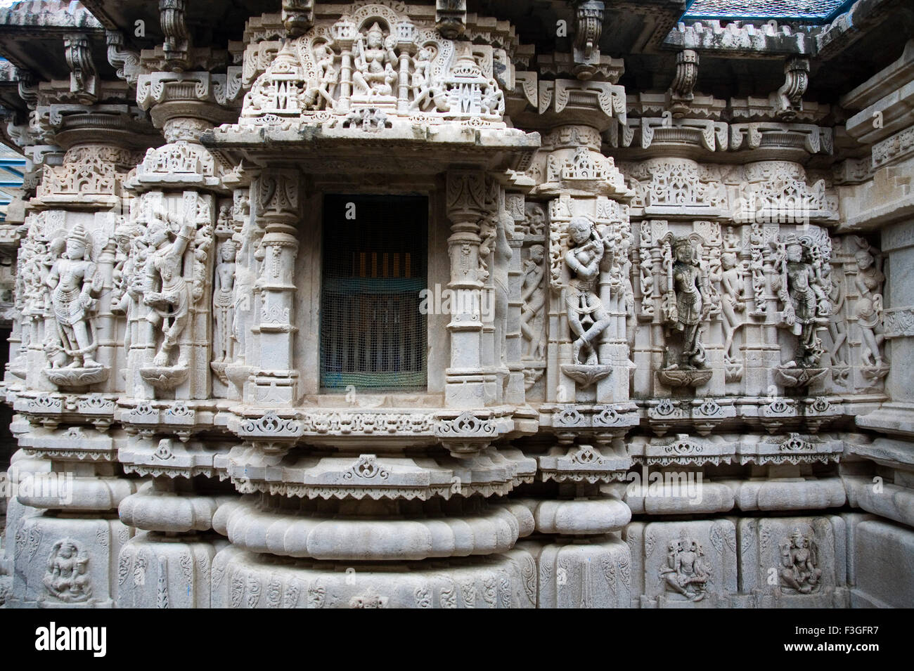 Sculptures dancing poses walls 2000 years old ancient monument Adinath Jain temple ; Village Delwara ; Udaipur ; Rajasthan Stock Photo