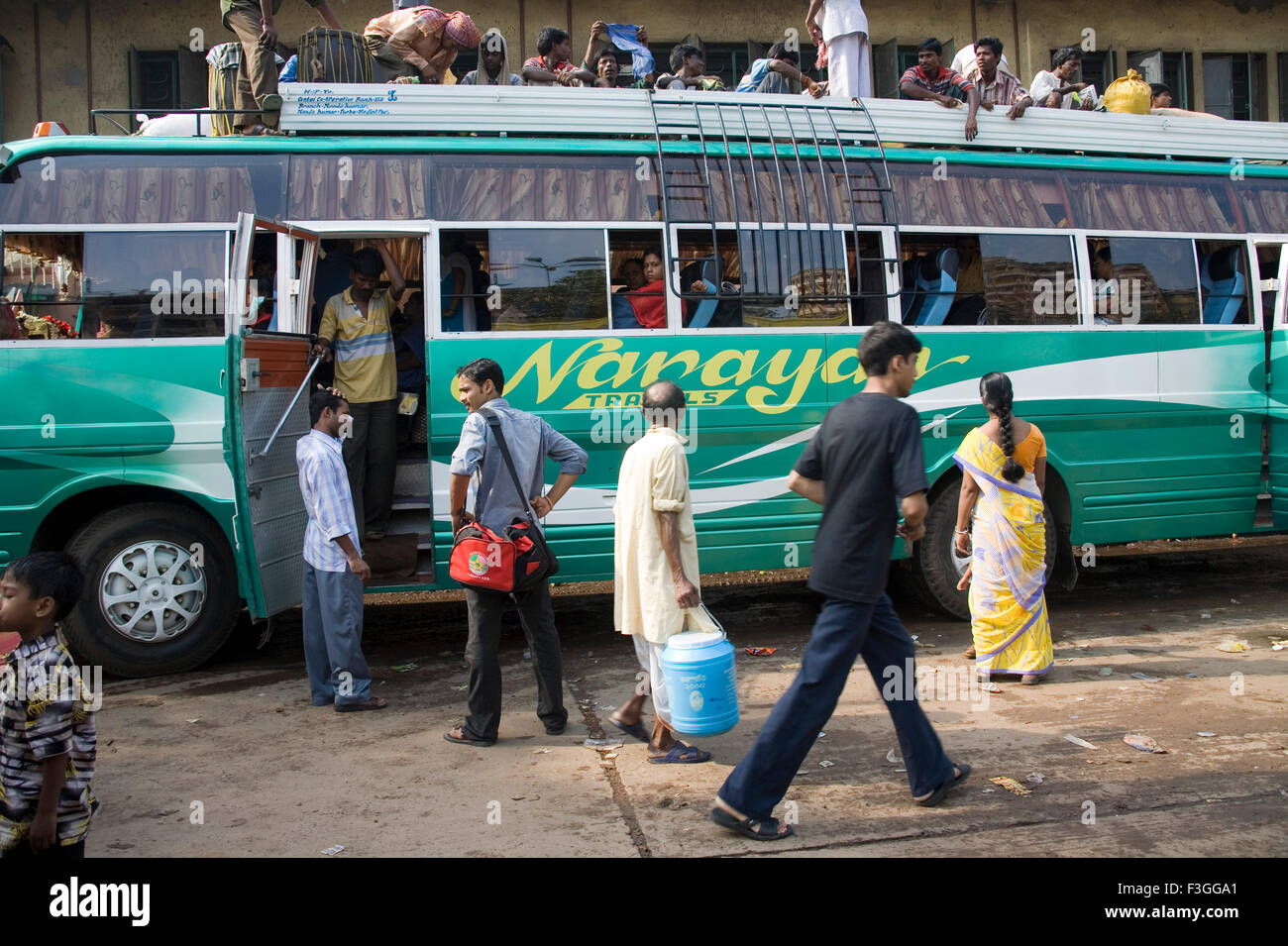 Street Scene ; local transportation by bus ; Calcutta Kolkata ; West