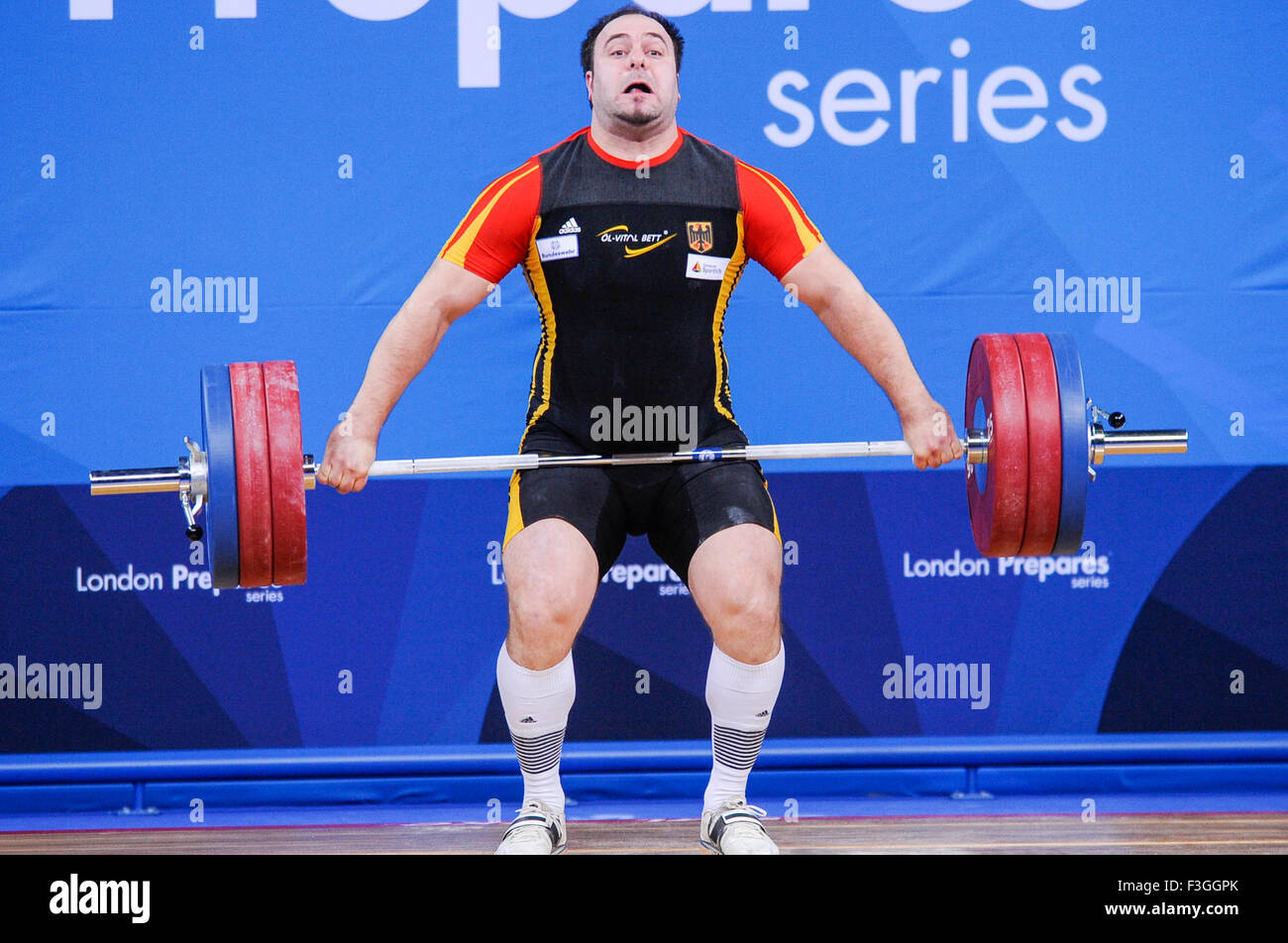Almir  VELAGIC (FRA) in the snatch, The London Prepares Weightlifting Olympic Test Event, ExCel Arena, London, England December  Stock Photo