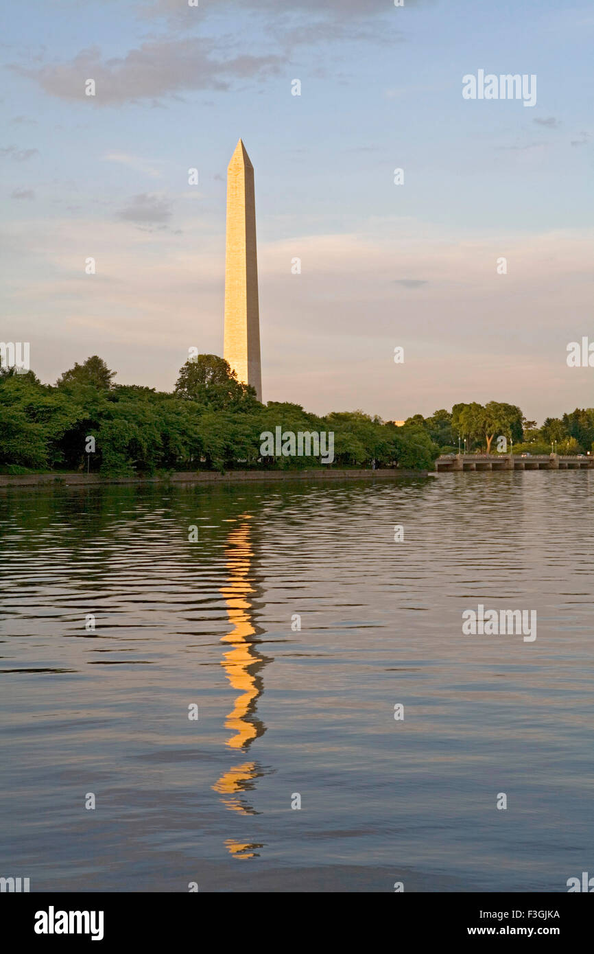 A 555 ft tall Washington monument rises above the mall in Washington dc ; U.S.A. United States of America Stock Photo