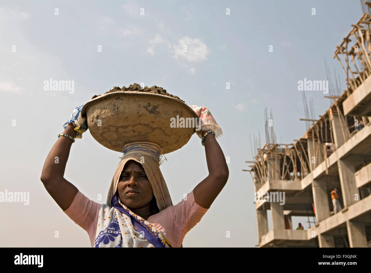 Carrying cement bags hires stock photography and images Alamy