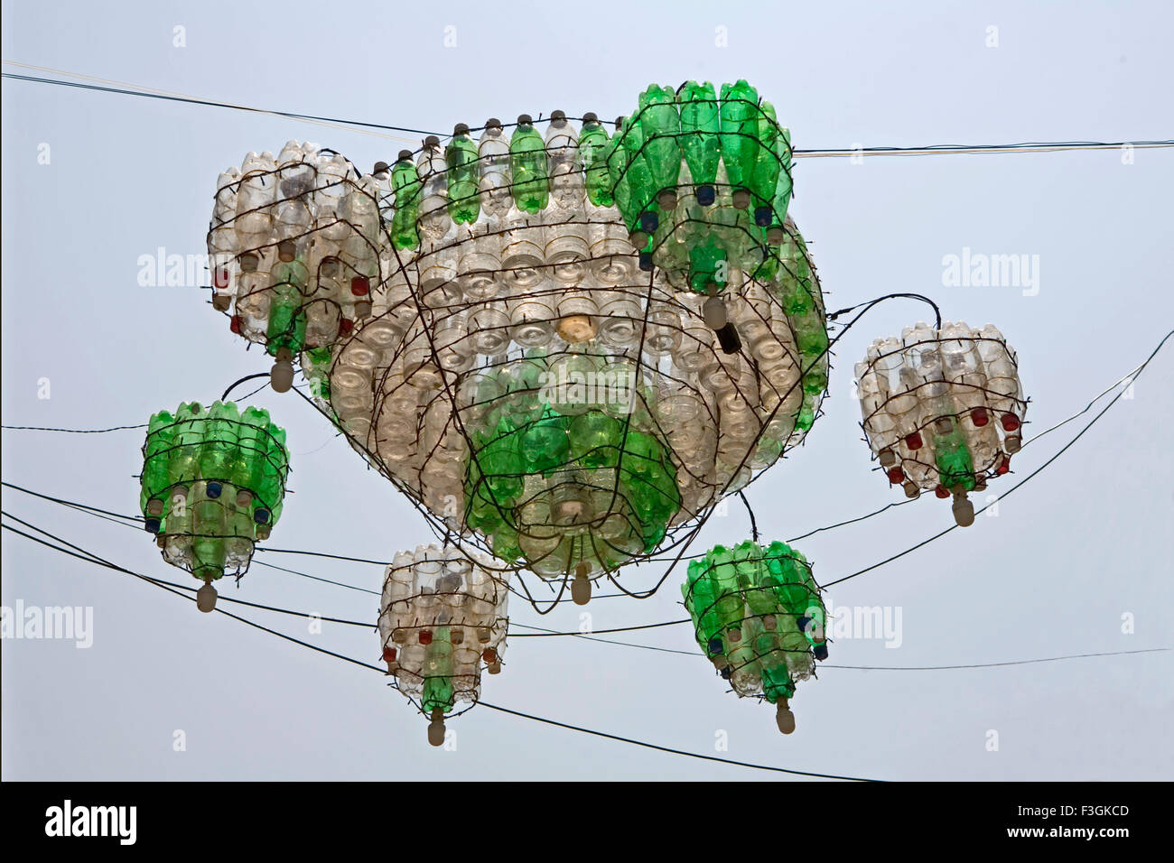 Chandelier made from recycled plastic soft drink bottles hanging in street ; Pondicherry ; Puducherry , Union Territory , UT , India , Asia Stock Photo