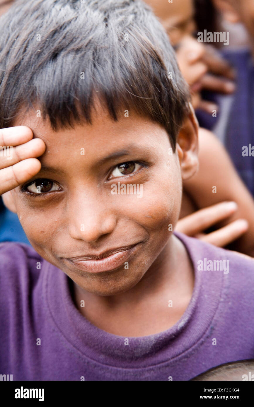 South Asian Indian Poor boy salaam smiling ; village Manik gunj ; Bangladesh Stock Photo