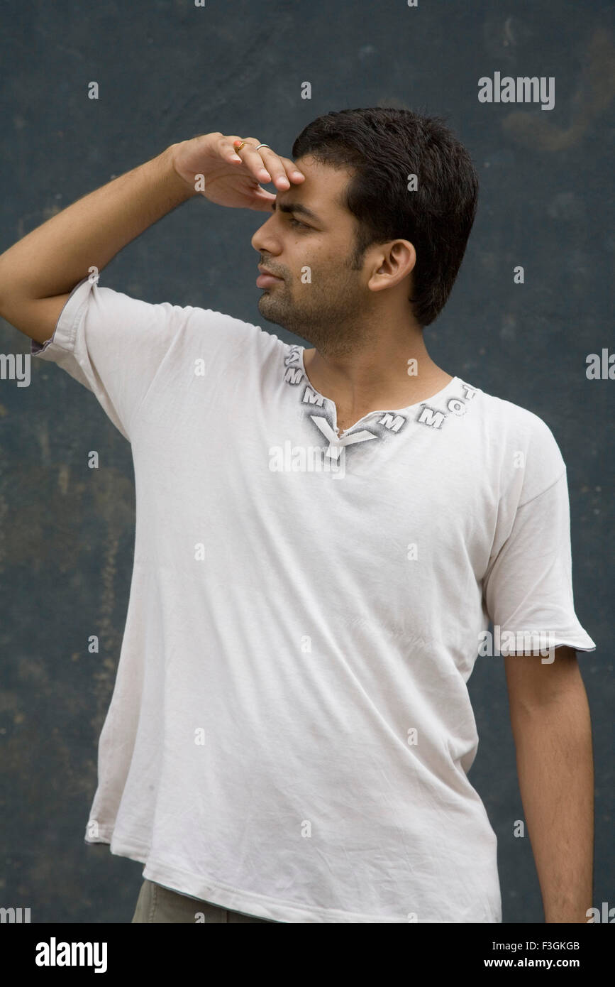 South Asian Indian twenty seven years old man Manish standing ; Bombay Mumbai ; Maharashtra ; India MR#202 Stock Photo