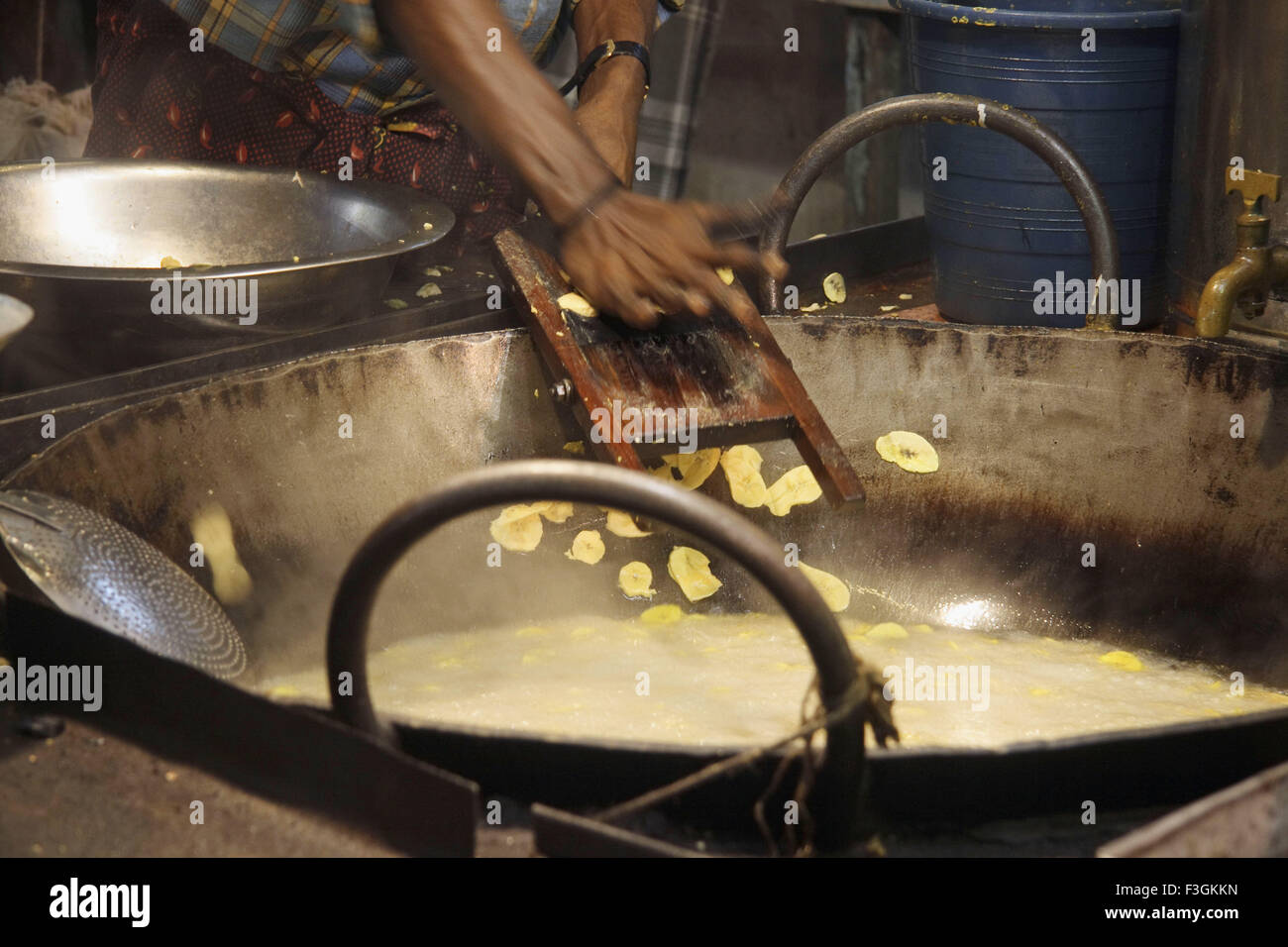 Banana wafer making ; Kurtallum ; Tamil Nadu ; India Stock Photo Alamy