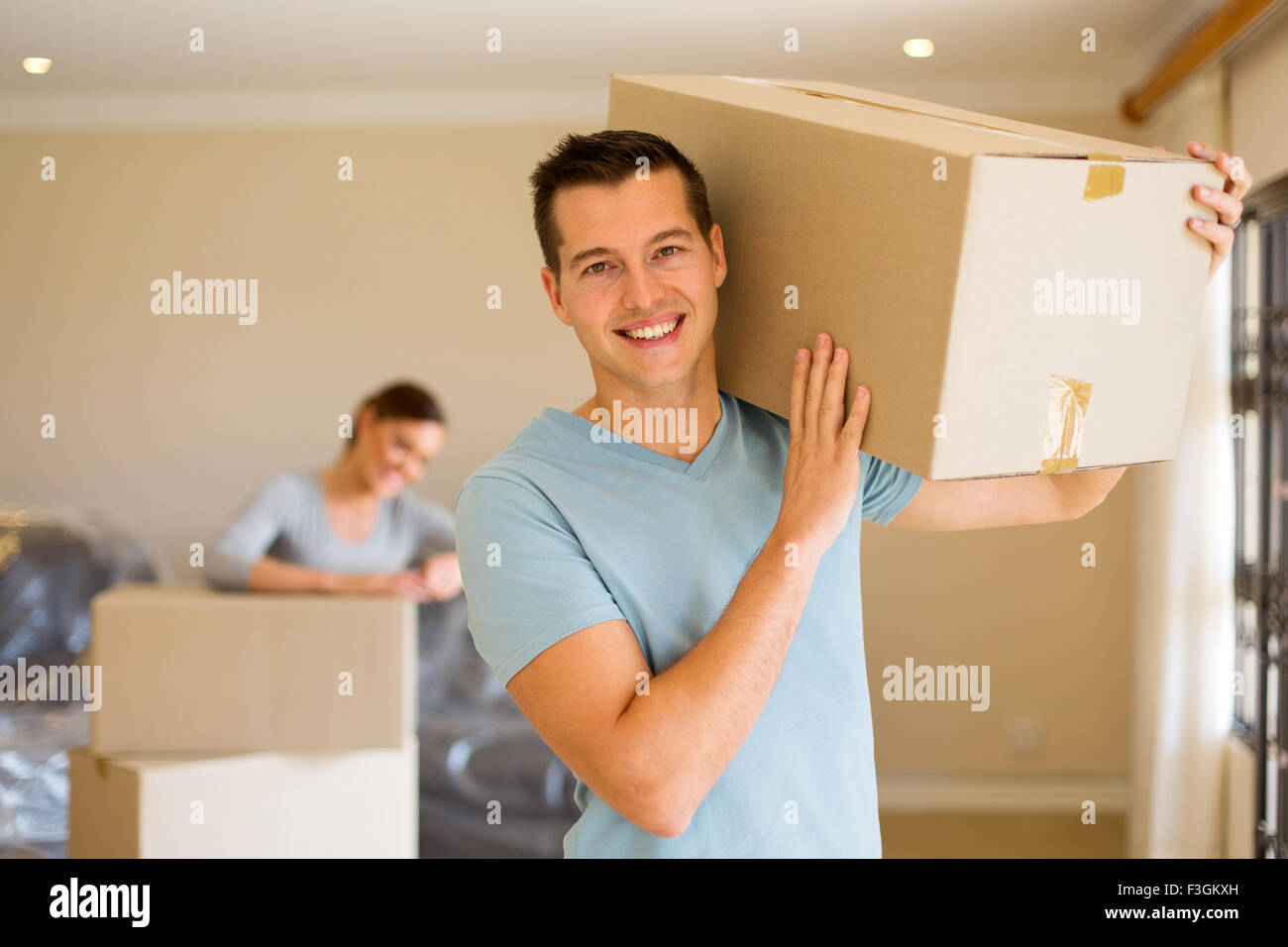 lovely young couple moving out Stock Photo