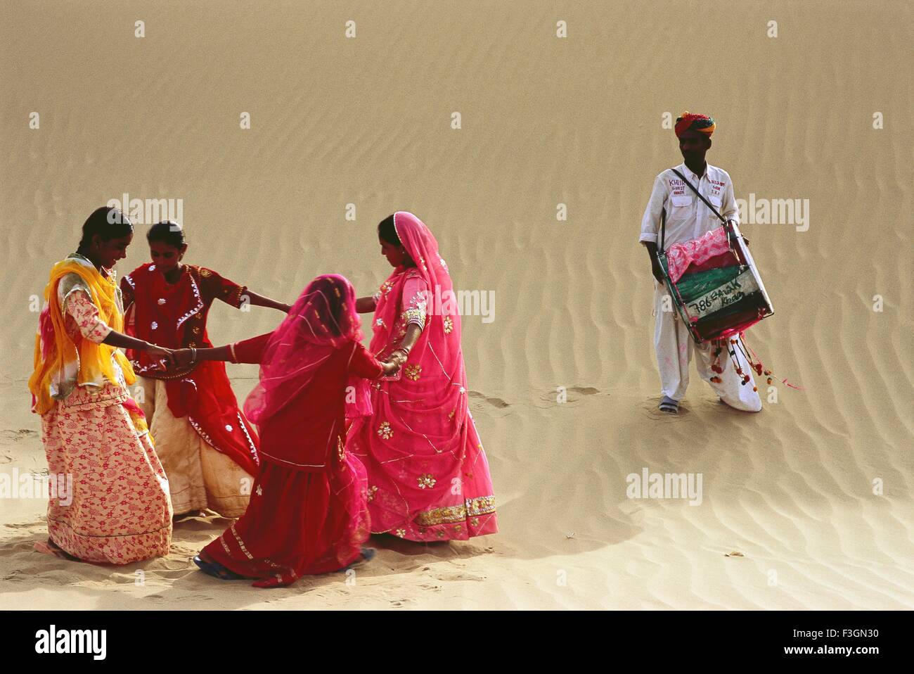Rajasthani man in traditional dance hires stock photography and images