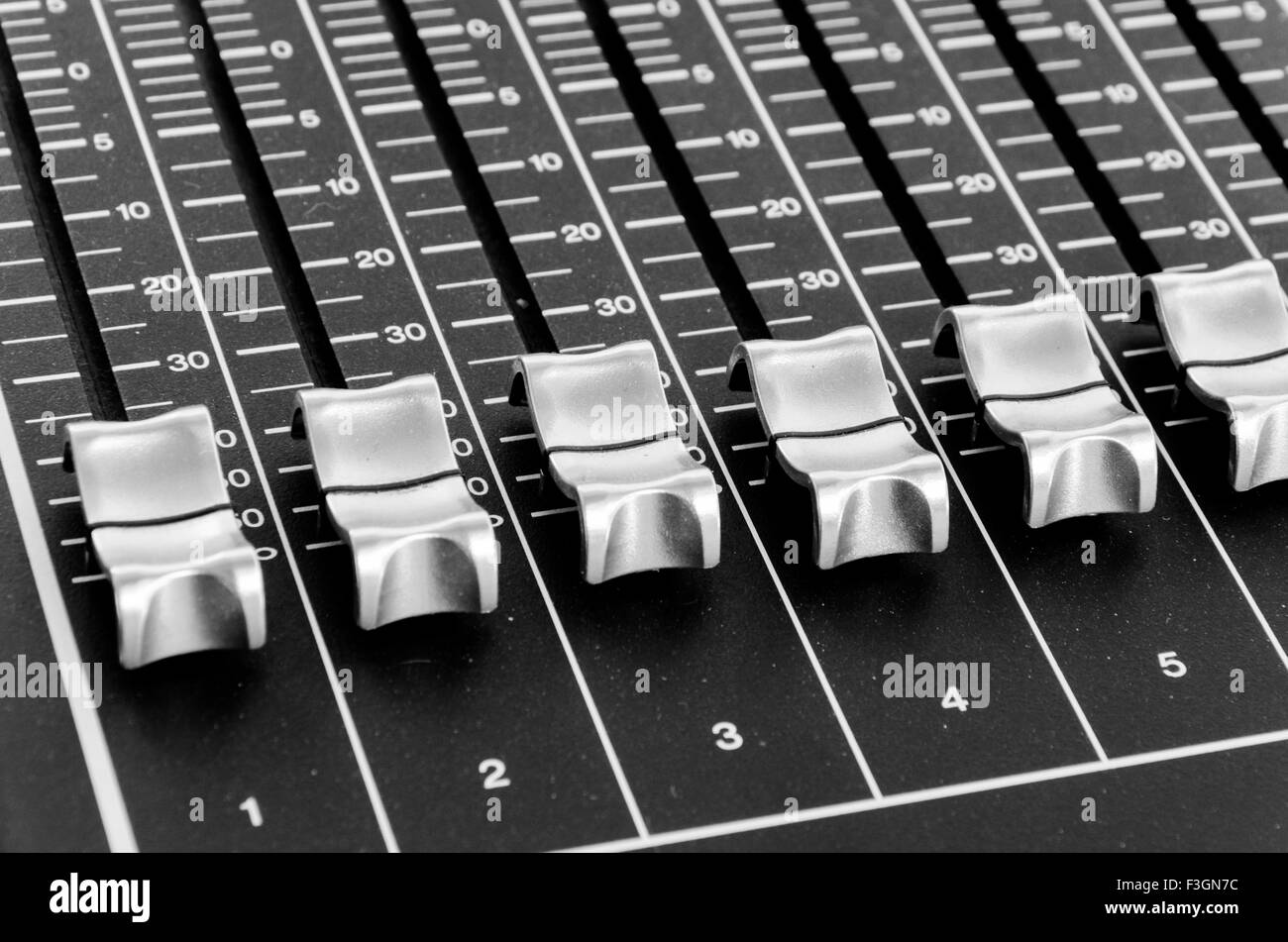 Buttons from a mix music table in black and white editorial Stock Photo