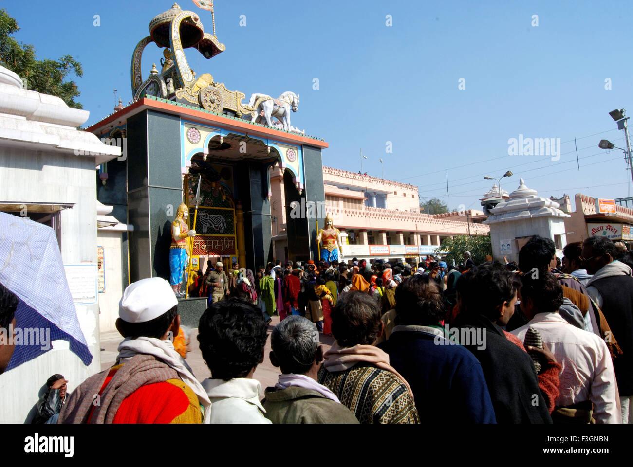 Queue of people at main gate Krishna Janmabhumi temple ; Mathura ; Uttar Pradesh ; India Stock Photo