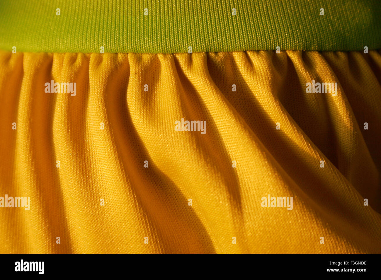 Abstract of knitted and stitched fabric in green and yellow color ; Pune; Maharashtra; India Stock Photo
