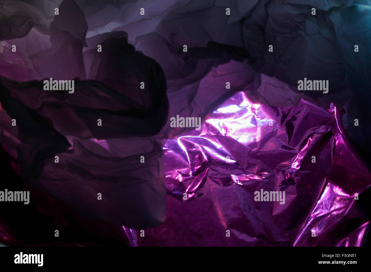 Abstract of plastic shopping bag on pink gift wrapping paper; Pune ; Maharashtra ; India Stock Photo