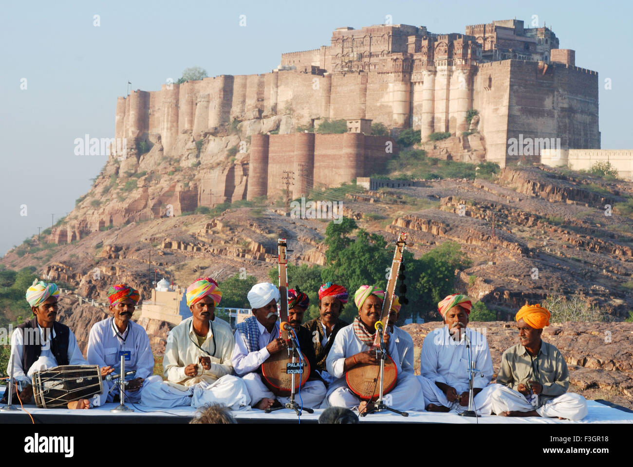 Folk musicians in Marwar festival backdrop fort ; Jodhpur ; Rajasthan ; India Stock Photo