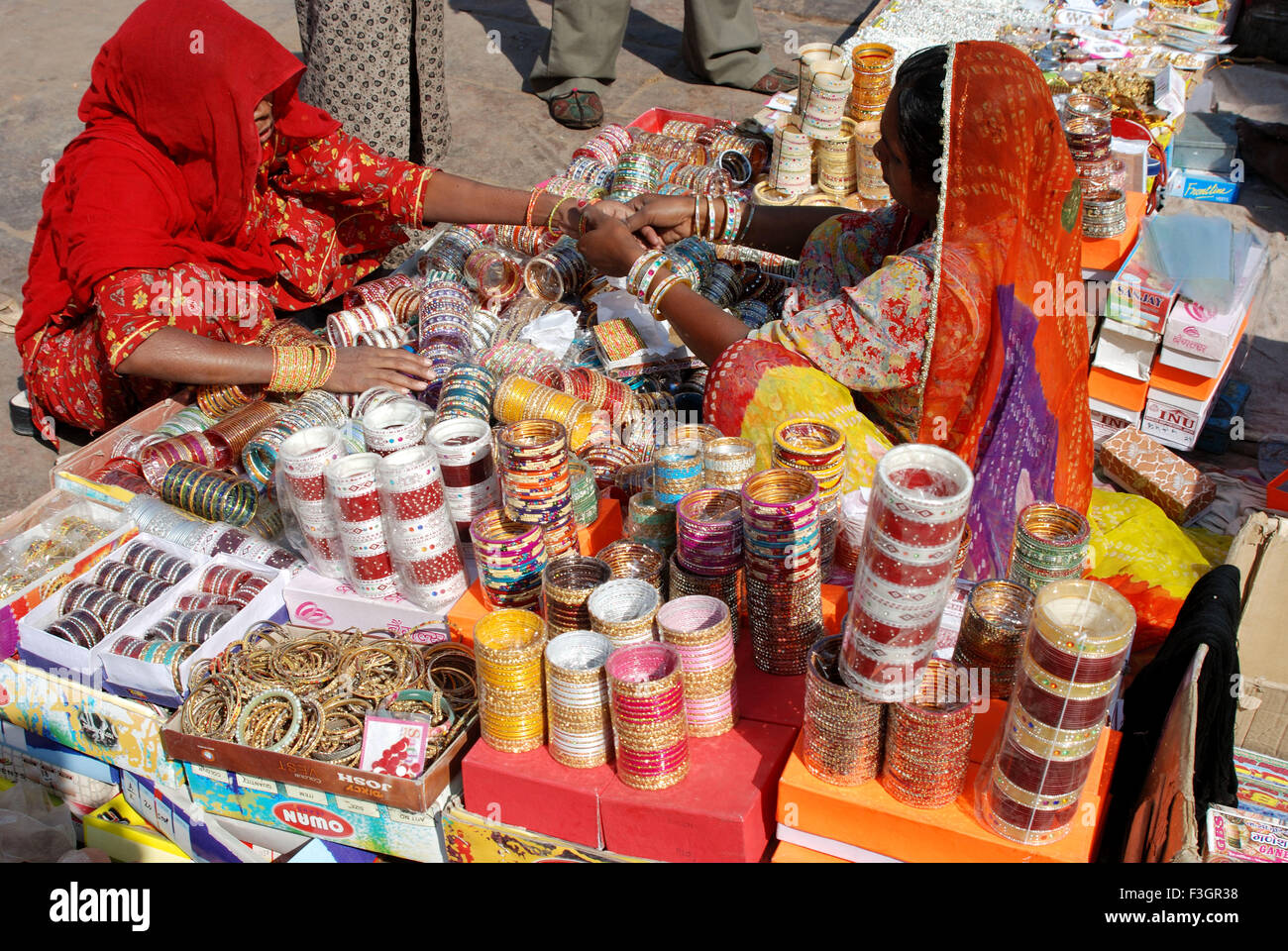 Purchasing glass bangles ; Jodhpur ; Rajasthan ; India Stock Photo Alamy