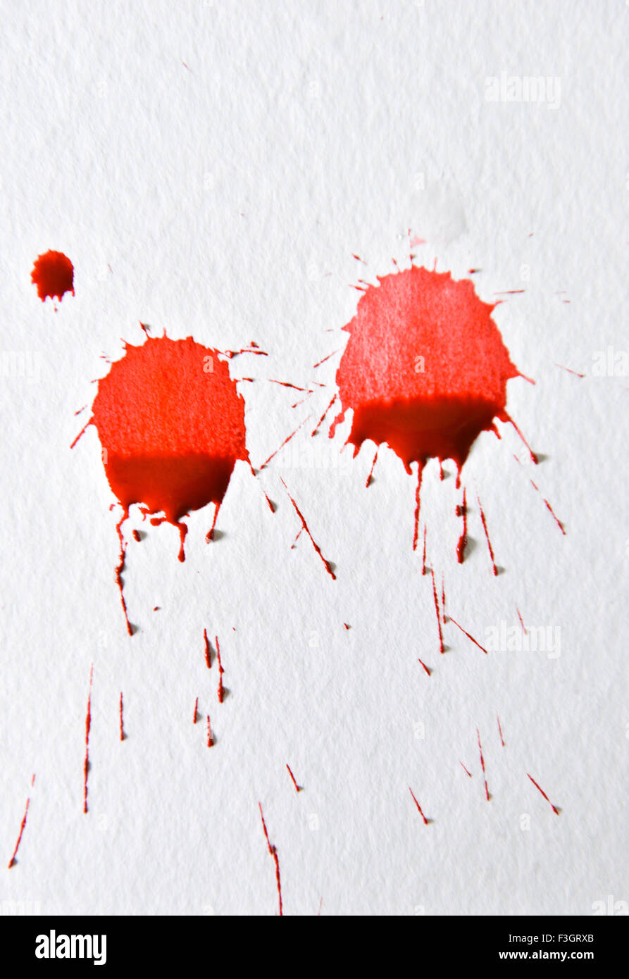 Dripping Ink on Paper Stock Photo