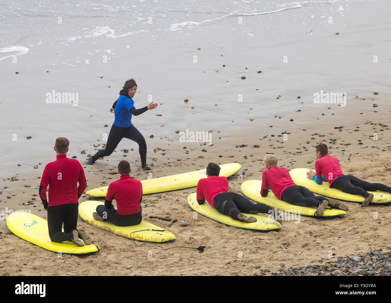 Surfing lesson at Saltburn by the sea, North Yorkshire, England. UK