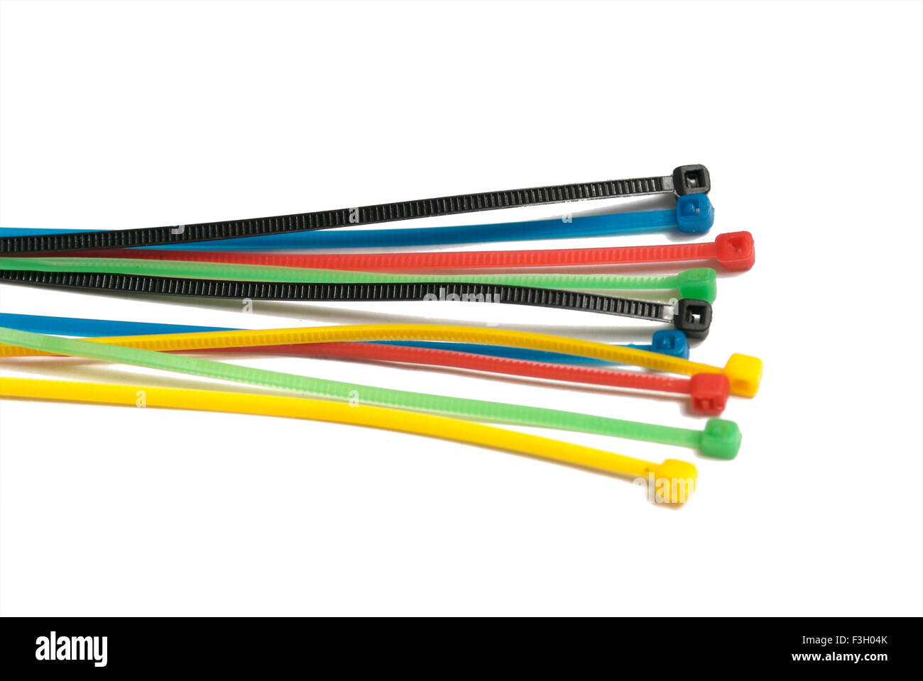 Colorful plastic cable ties on white background Stock Photo