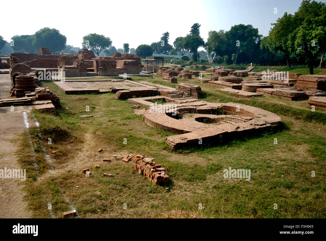 Ruined monasteries near Dhamekh stupa ; Sarnath ; Varanasi ; Uttar Pradesh ; India Stock Photo