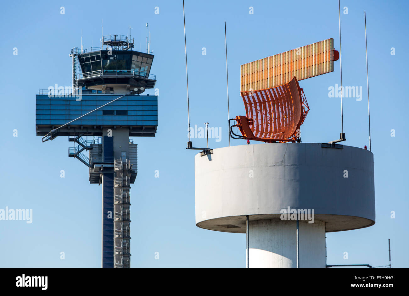 Air traffic control tower and radar tower, Düsseldorf International airport, Germany Stock Photo