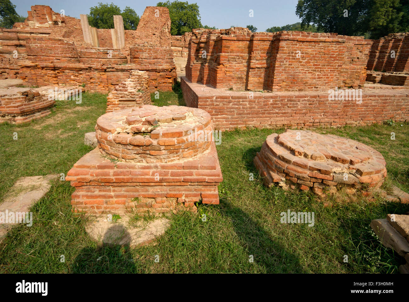 Ruined monasteries near Dhamekh stupa ; Sarnath ; Varanasi ; Uttar Pradesh ; India Stock Photo