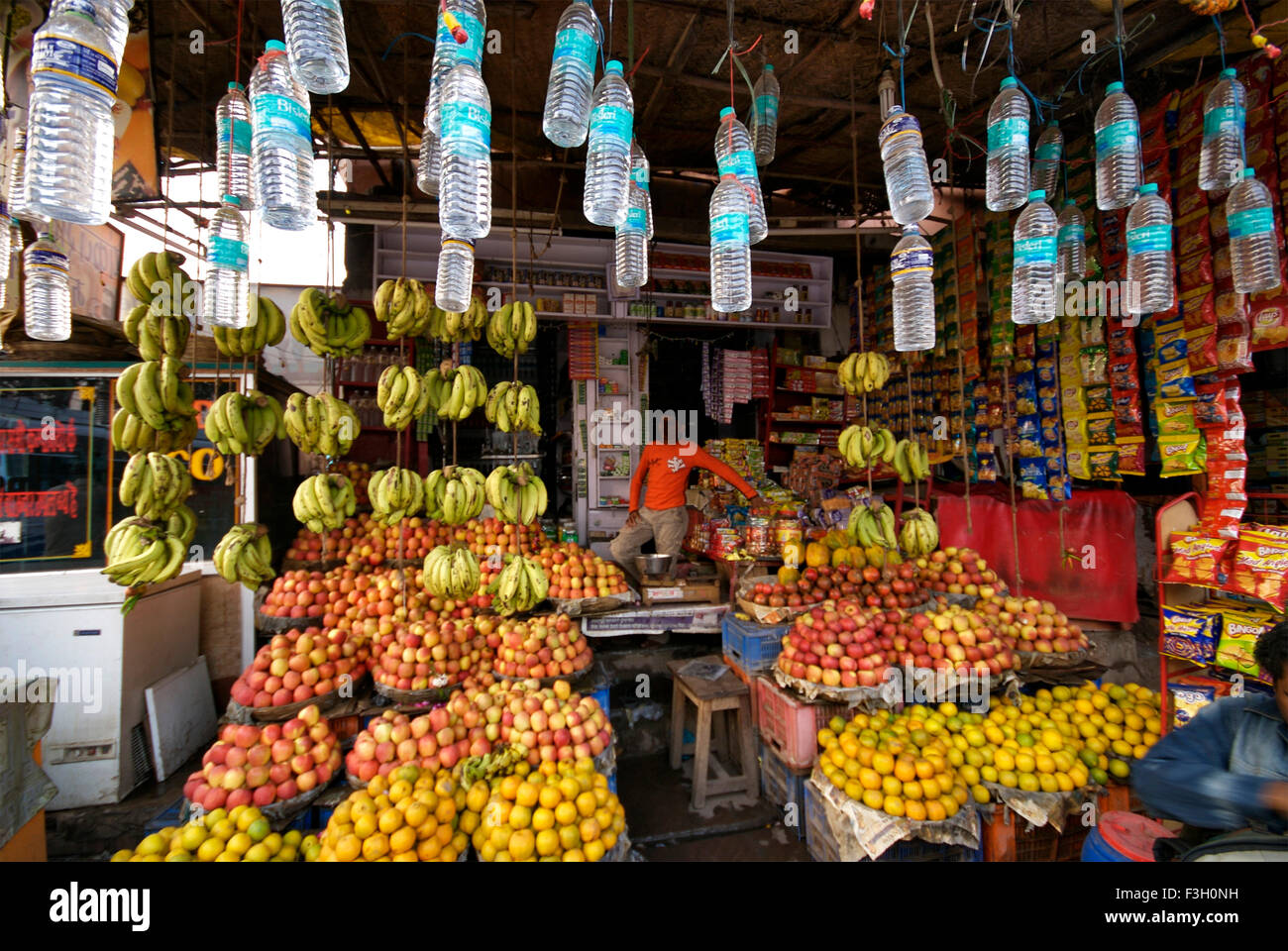 Fruit Vendor with fruits stall ; Madhya Pradesh ; India Stock Photo