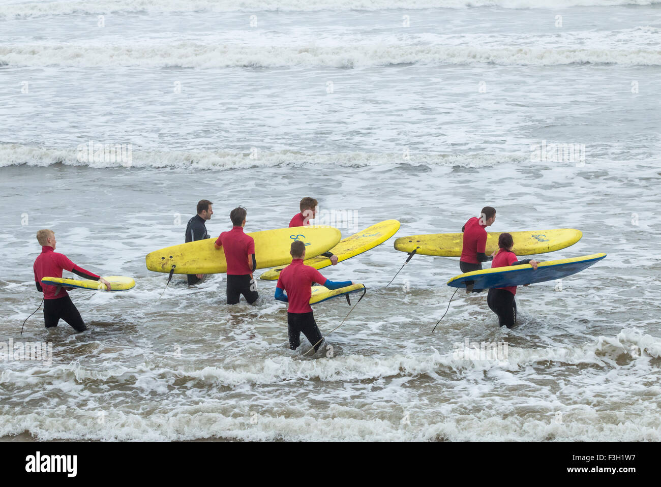 Surfing lesson at Saltburn by the sea, North Yorkshire, England. UK