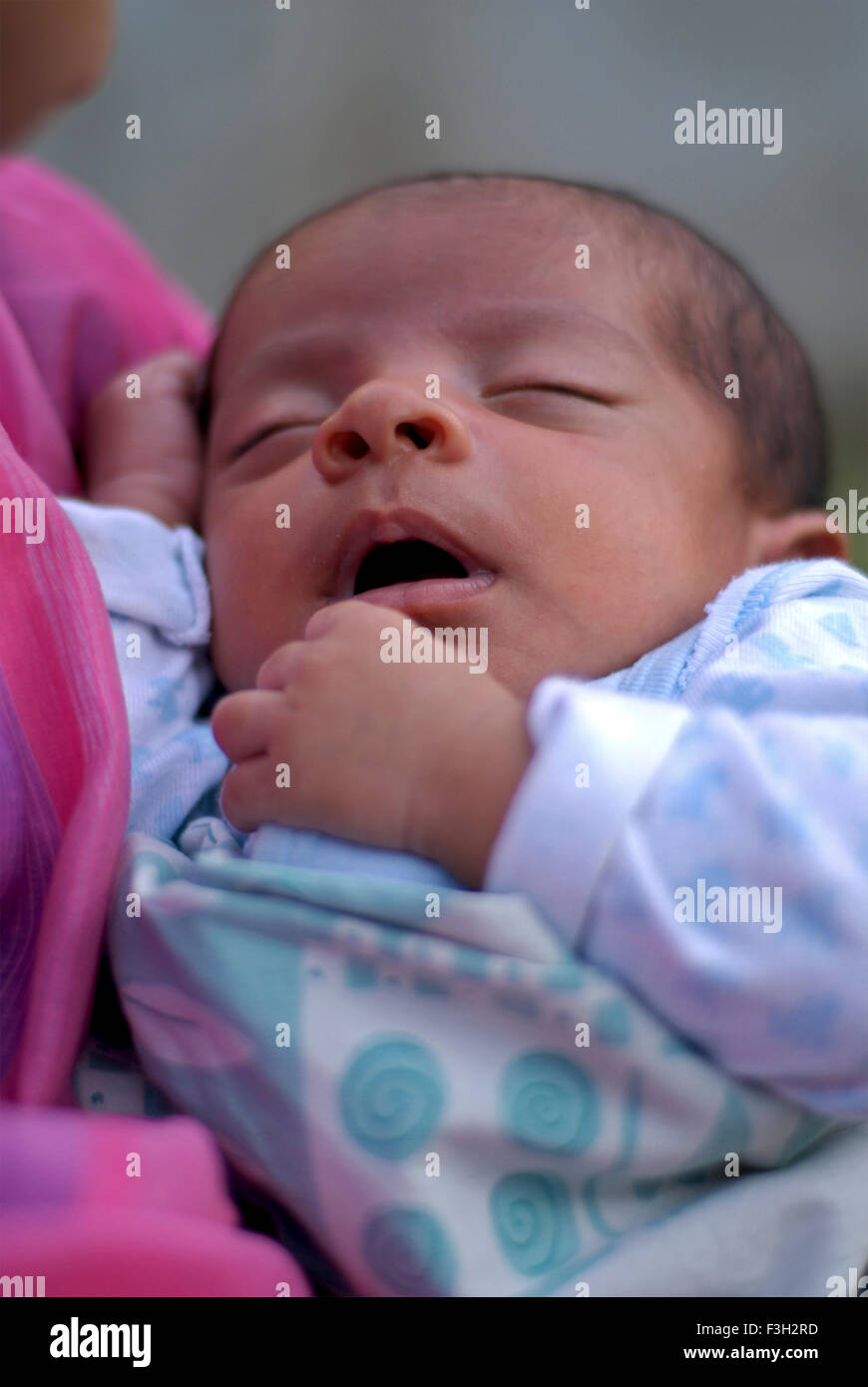 Junior Ulfat One month old baby in his mother arms ; Dehradun ; Uttaranchal ; India MR#711 Stock Photo