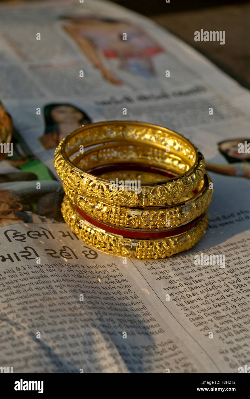 Gold plated brass bangles ; Rajkot ; Gujarat ; India Stock Photo Alamy